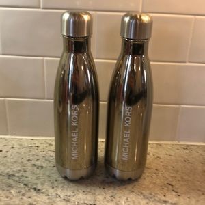 Pair of Michael Kors water bottles